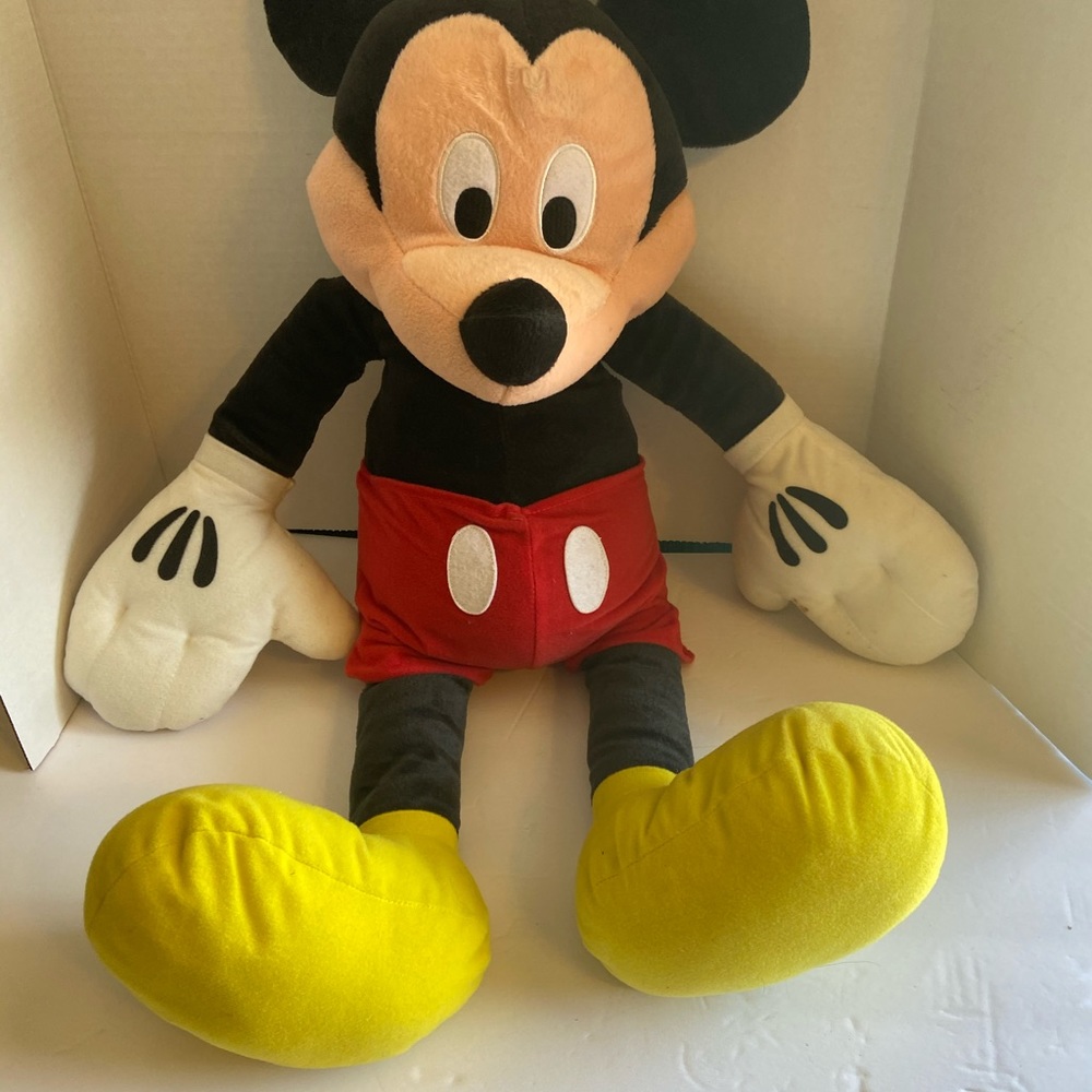 Mickey original and skeleton plushies